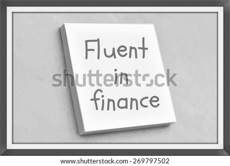 Vintage style text fluent in finance on the short note texture background