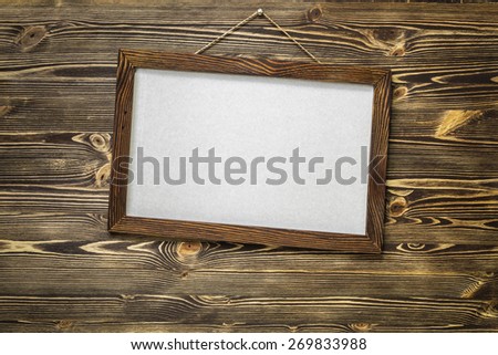 Frame on a wooden wall