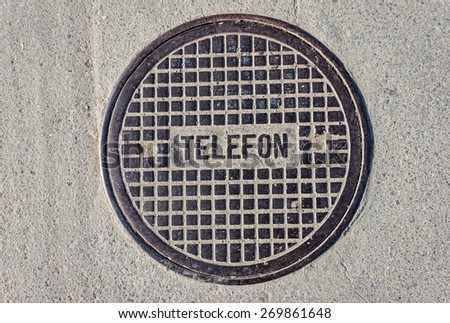 Telephone manhole cover