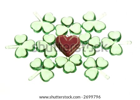 heart surrounded by clovers
