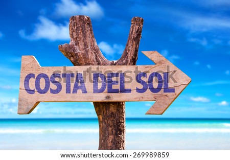 Costa Del Sol wooden sign with beach background