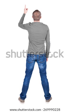 Back view of  pointing young men in  shirt and jeans. Young guy  gesture. Rear view people collection.  backside view of person.  Isolated over white background. 