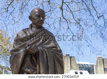 A statue of Mahatma Gandhi situated on Parliament Square in London. Royalty-Free Stock Photo #270036059