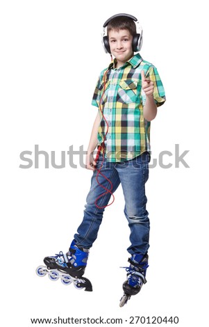 Full length portrait a boy on rollers with earphones pointing forward sign isolated