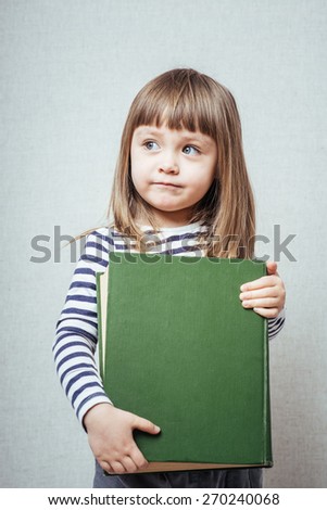 little girl reading book 