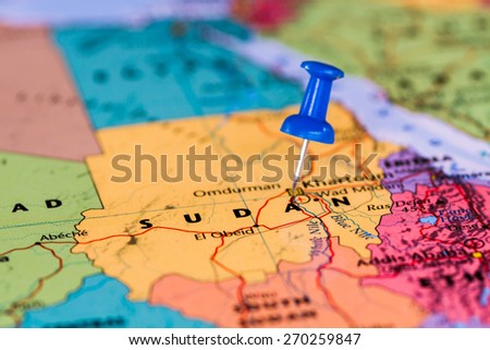 Map of Sudan  with a blue pushpin stuck Royalty-Free Stock Photo #270259847