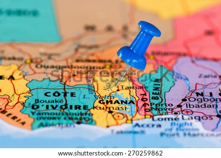 Map of Ghana with a blue pushpin stuck Royalty-Free Stock Photo #270259862
