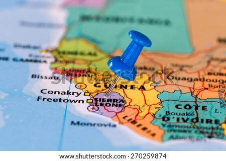 Map of Sierra leone with a blue pushpin stuck Royalty-Free Stock Photo #270259874