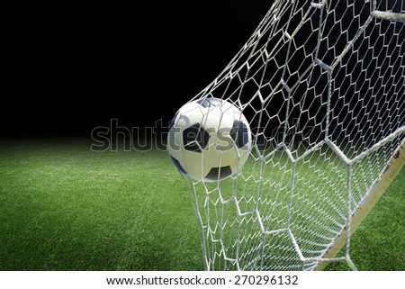 soccer ball in goal Royalty-Free Stock Photo #270296132