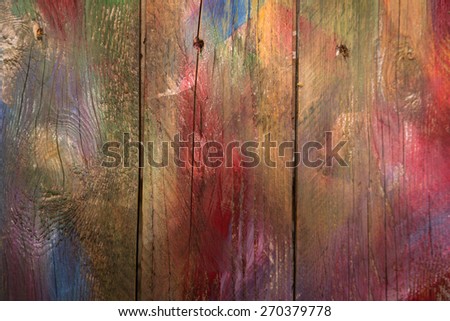 Background of wooden boards colored with mixed colors 