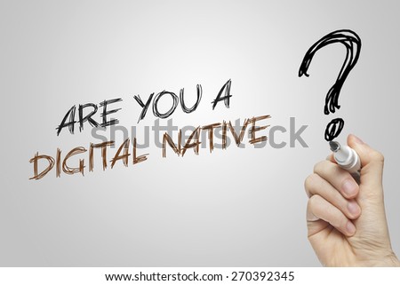 Hand writing are you a digital native on grey background