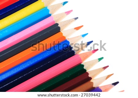 Writing materials: coloured pencils background.