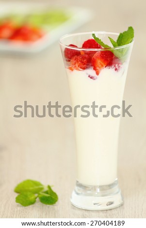 strawberry and raspberry yogurt with muesli