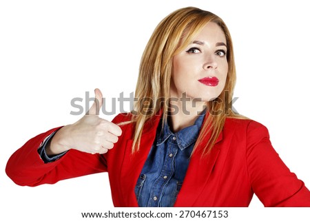 Portrait of young beautiful business woman in red jacket showing showing hand ok sign
