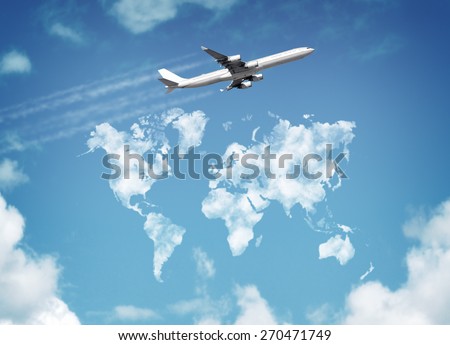 Passenger airplane flying above sky with clouds in shape of world map concept for travel and vacations