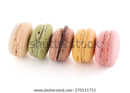 Colorful French Macarons on the white background.