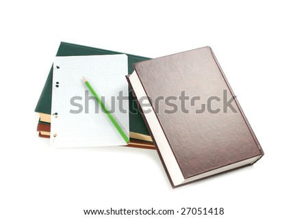 books, paper and pen isolated on white