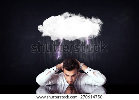 Depressed businessman sitting under a lightning rainy cloud 