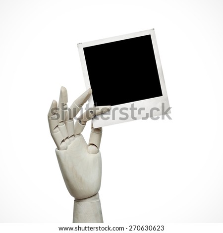 White wood hand with photo frame