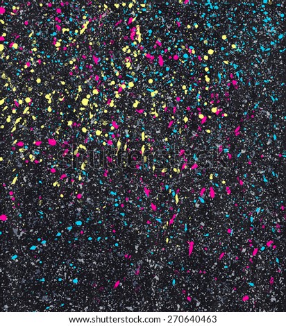 Colorful vector splatters on a black background