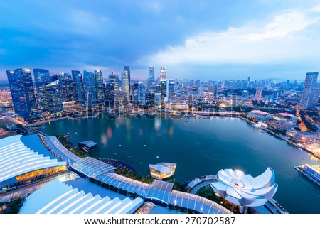 Singapore view with urban skyscrapers at night. Royalty-Free Stock Photo #270702587