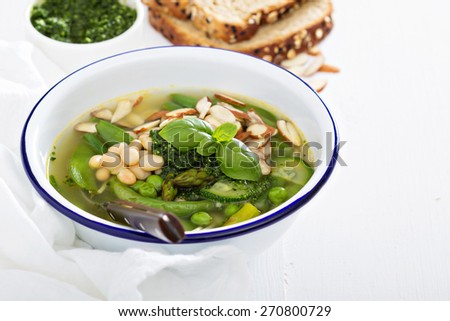Minestrone soup with spring green vegetables and white beans