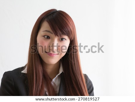 Pretty Japanese woman with a patient smile