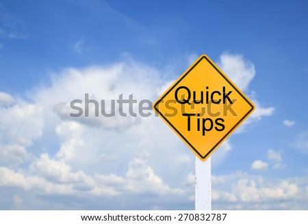Road sign indicating Quick Tips on blurred sky and cloud with sunlight background