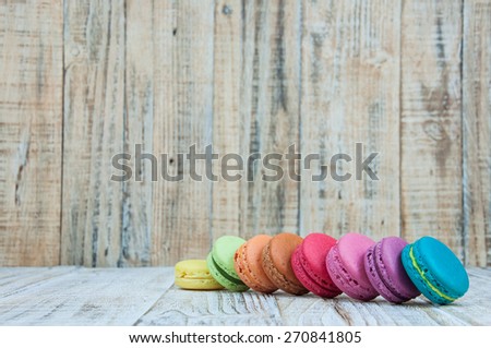 Colorful French Macaroon on wooden background
