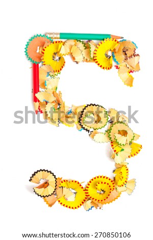 Photo of Figure 5 from colored shavings on white background