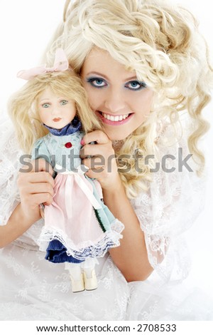 picture of happy bride with doll over white