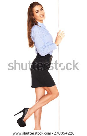 Pretty office employee behind a white board
