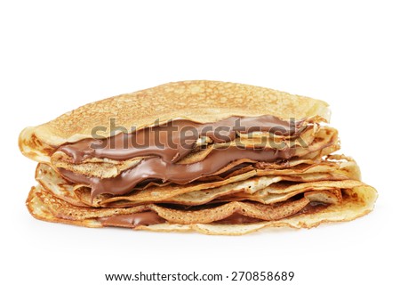 fresh hot blinis or crepes withc chocolate cream isolated on white Royalty-Free Stock Photo #270858689