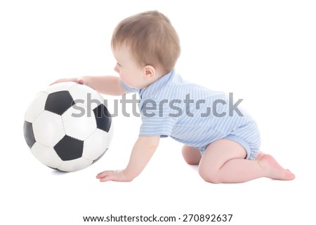 funny baby boy toddler playing with soccer ball isolated on white background