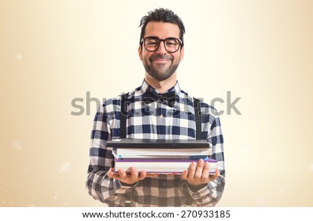 Posh boy holding books