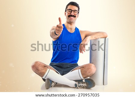 Crazy sportman with thumb up 