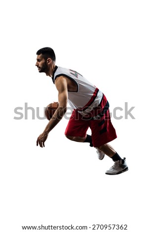 Isolated on white basketball player in action is flying high 