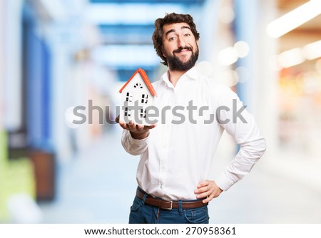 man holding a house