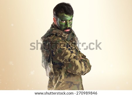 soldier with his face painted