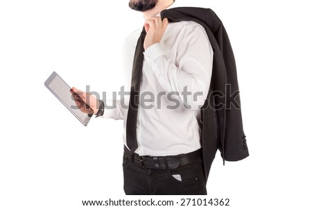 Hipster man in a classic suit isolated on a white background with a tablet in hand. High resolution. 