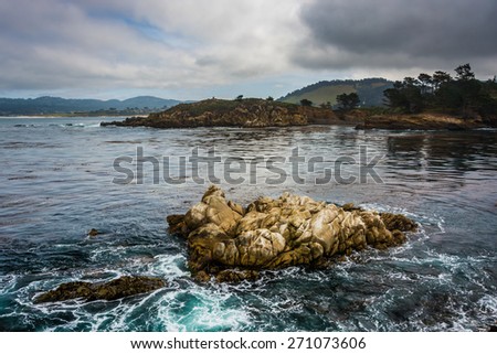 View of rocks and waves in the Pacific Ocean at Point Lobos State Natural Reserve, in Carmel, California.