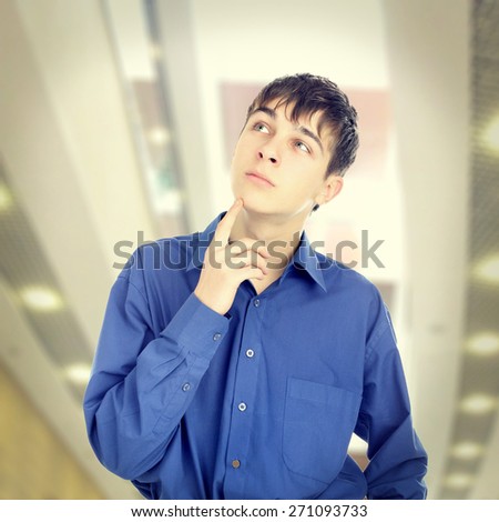 Toned Photo of Pensive Teenager in the Big Hall