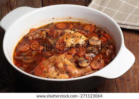 Hunters rabbit stew with carrot in a pan