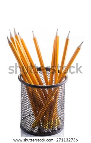an image of lead pencils in metal pot on a white background
