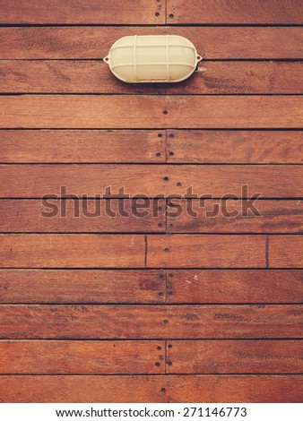 Lamp on wooden background