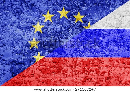 EU and Russia, flags painted on cracked concrete