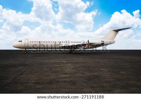 Commercial airplane ready to take off. With blue sky background
