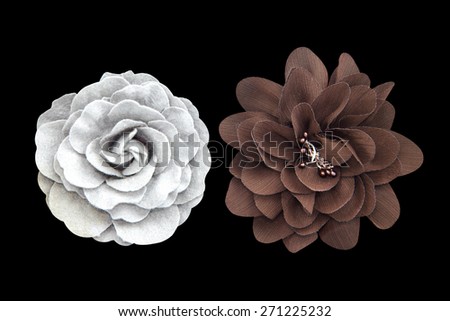 Beautiful cloth artificial flowers isolated on black