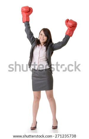 Exciting gloved business woman on white background.