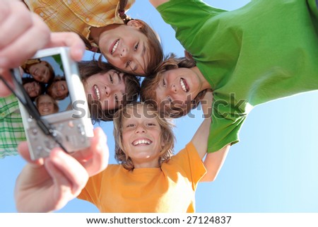 happy kids taking photo